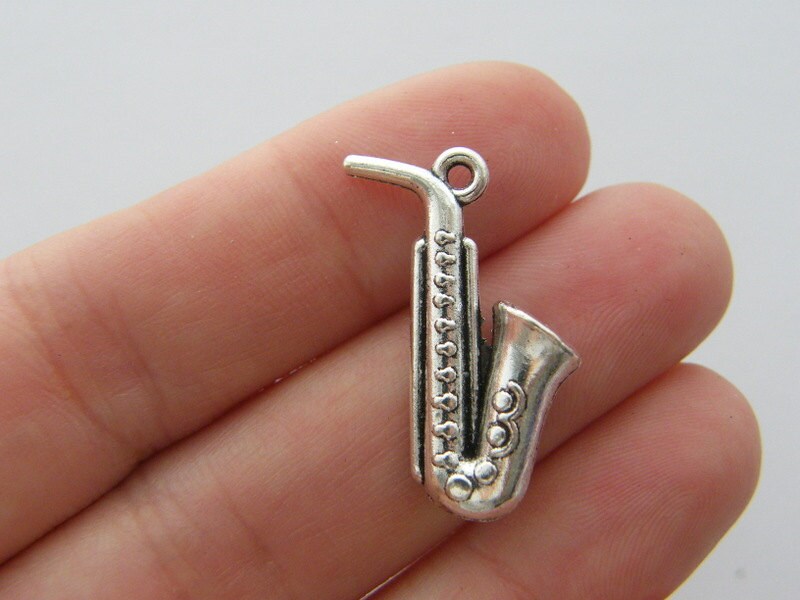 4 Saxophone charms antique silver tone MN64