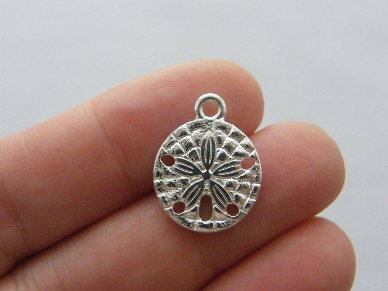 8 Sand dollar charms silver plated tone FF297