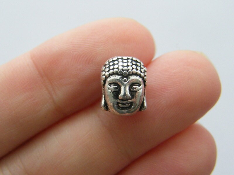 8 Buddha spacer beads antique silver tone R74