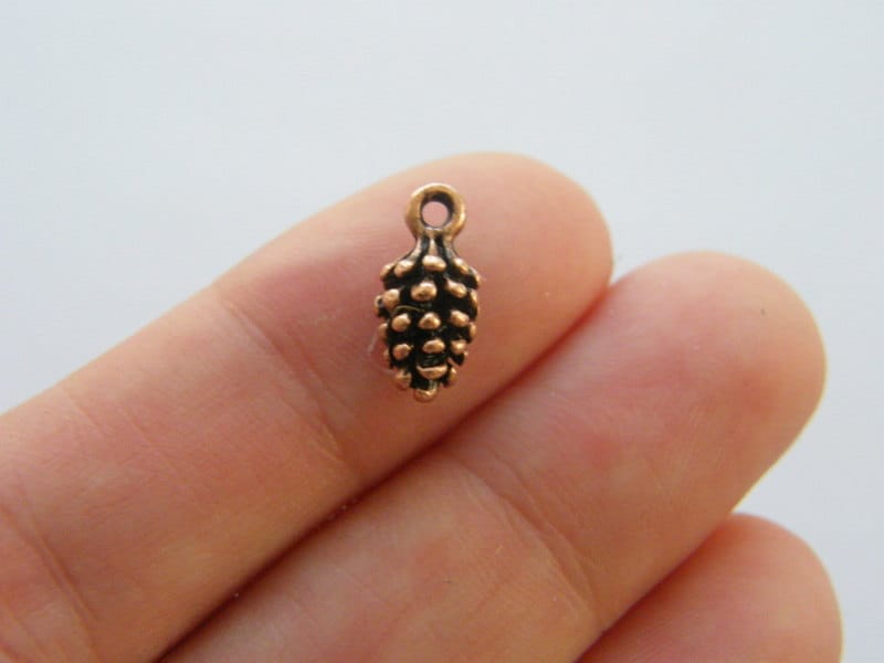12 Pine cone charms antique copper tone L139