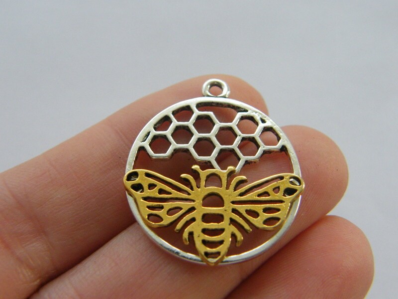 BULK 20 Bee and honeycomb  charms silver and gold tone A631