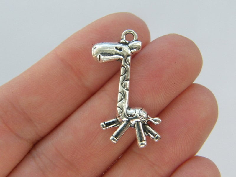 4 Giraffe charms antique silver tone A622