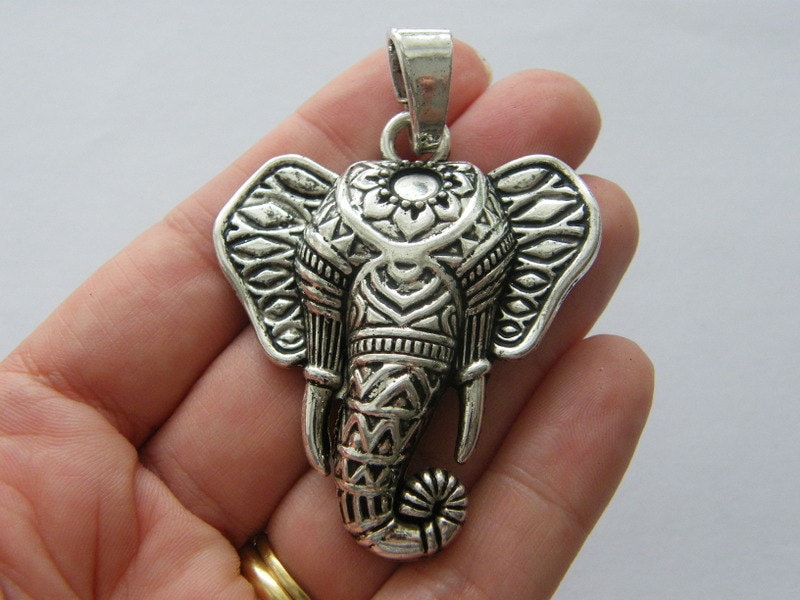 2 Elephant pendants antique silver tone A374