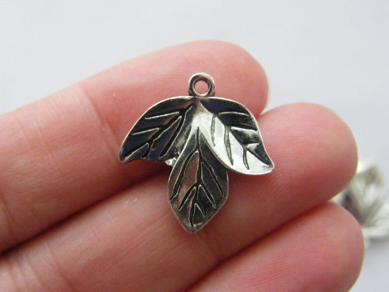 10 Leaf charms antique silver tone L84