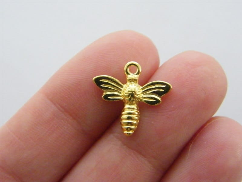 10 Bee charms gold tone A359