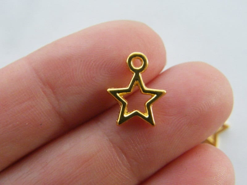 14 Star charms gold tone S164