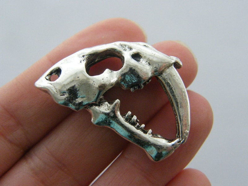 1 Saber tooth tiger skull charm antique silver tone A491