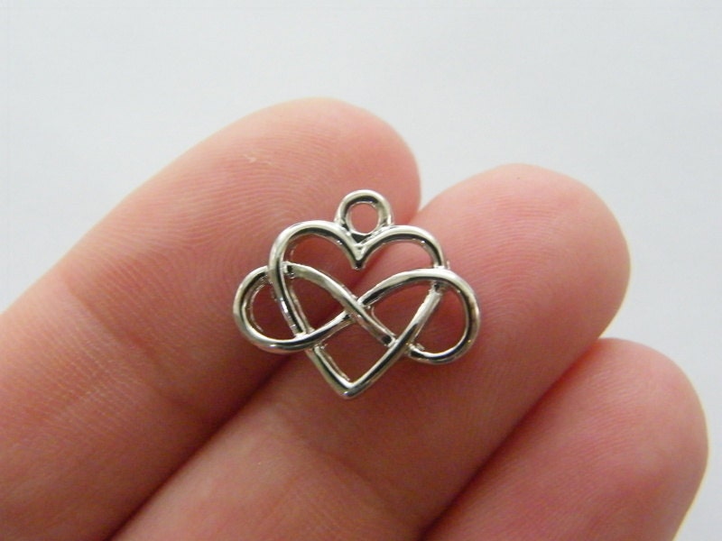 4 Infinity heart charms silver tone R69