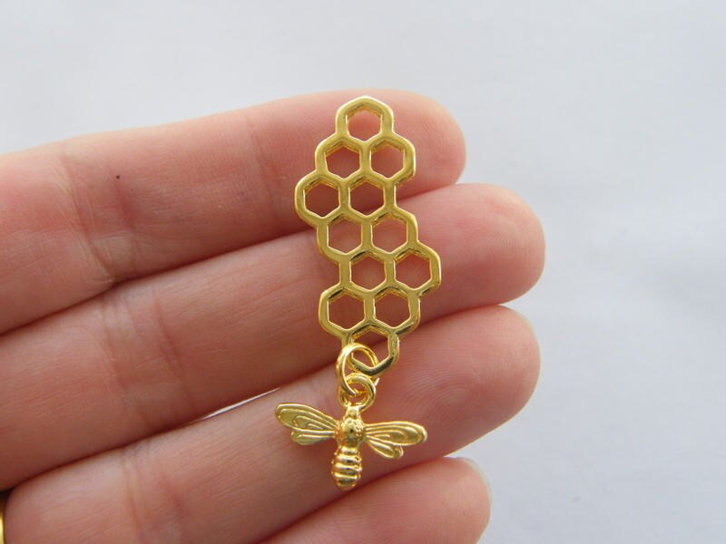 4 Bee and honeycomb charms gold tone A872