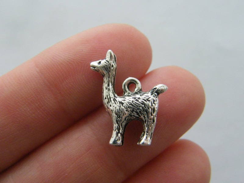 4 Llama alpaca charms antique silver tone A560