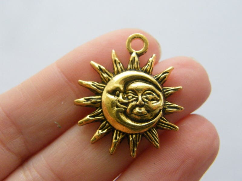 4  Moon and sun pendants antique gold tone M123