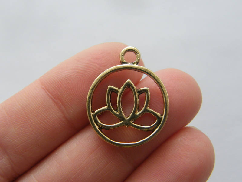 12 Lotus flower charms antique gold tone F406