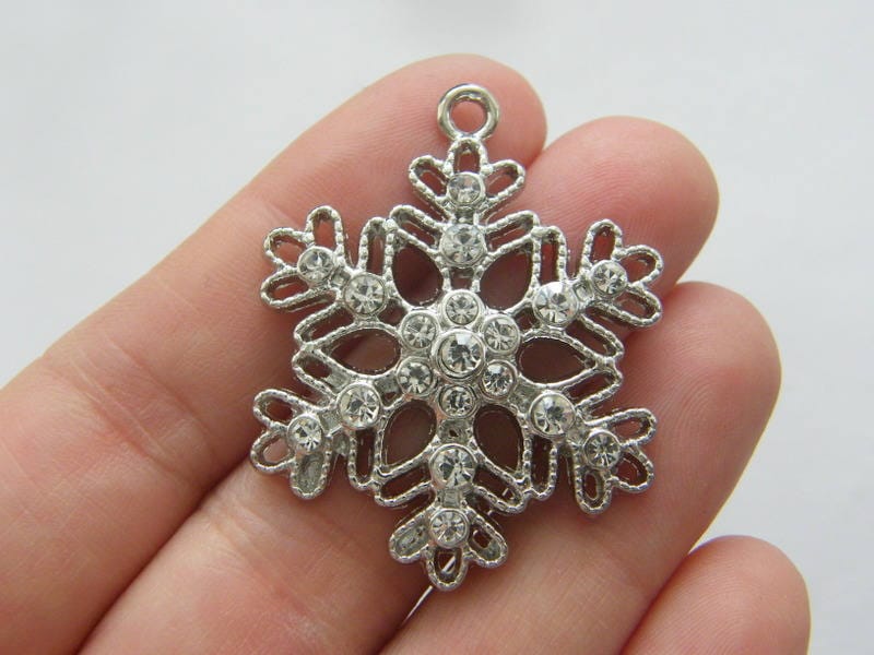 2 Rhinestone snowflake charms silver tone CT131