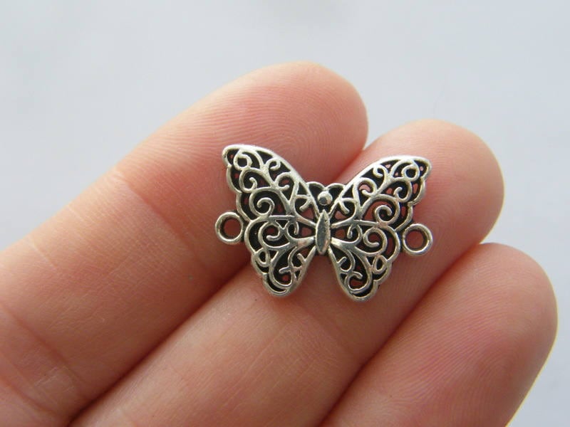 10 Butterfly connector charms antique silver tone A389