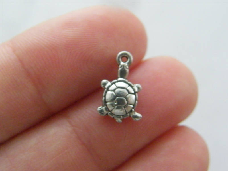 30 Tortoise charms  antique silver tone FF44