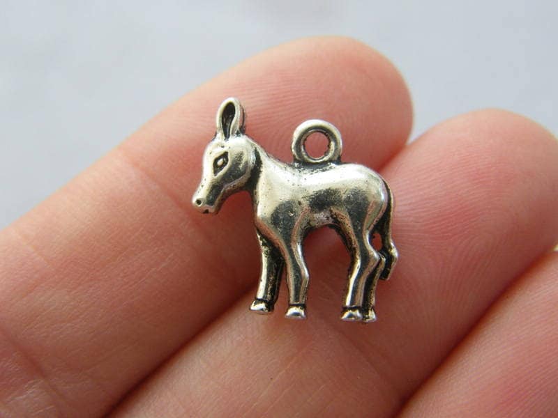 4 Donkey charms antique silver tone A684