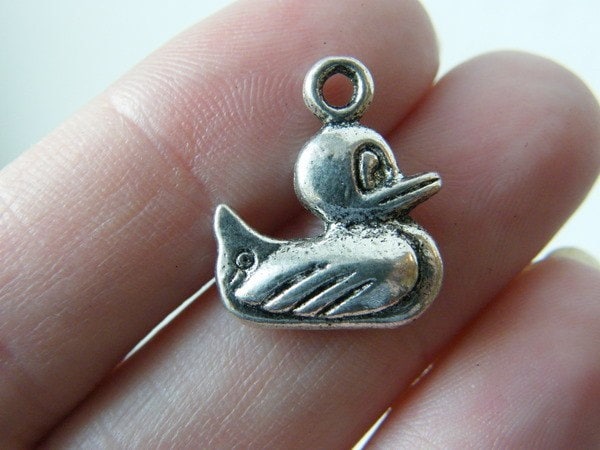 12 Duck charms antique silver tone B138