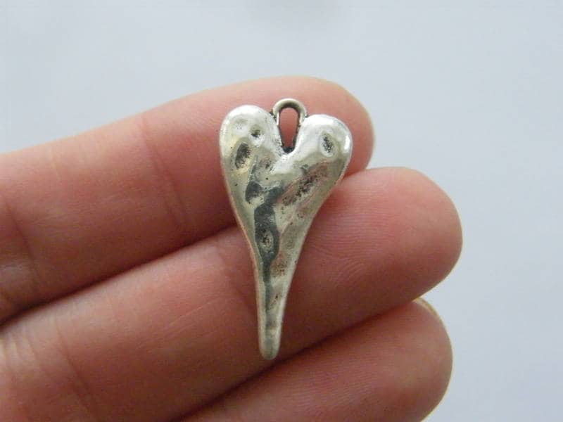 6 Heart pendants  silver tone H139