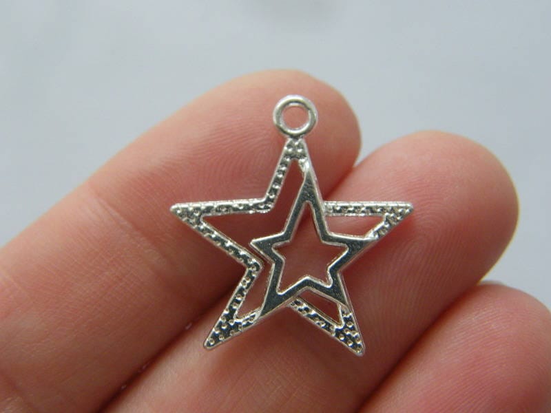 BULK 50 Star charms silver plated tone S44