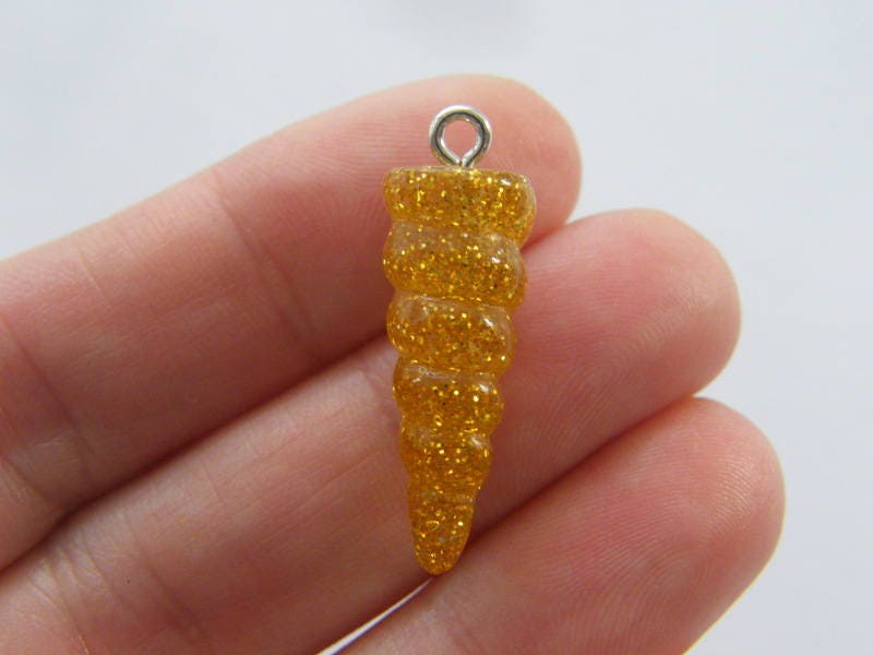 4 Unicorn horn gold resin charms A714