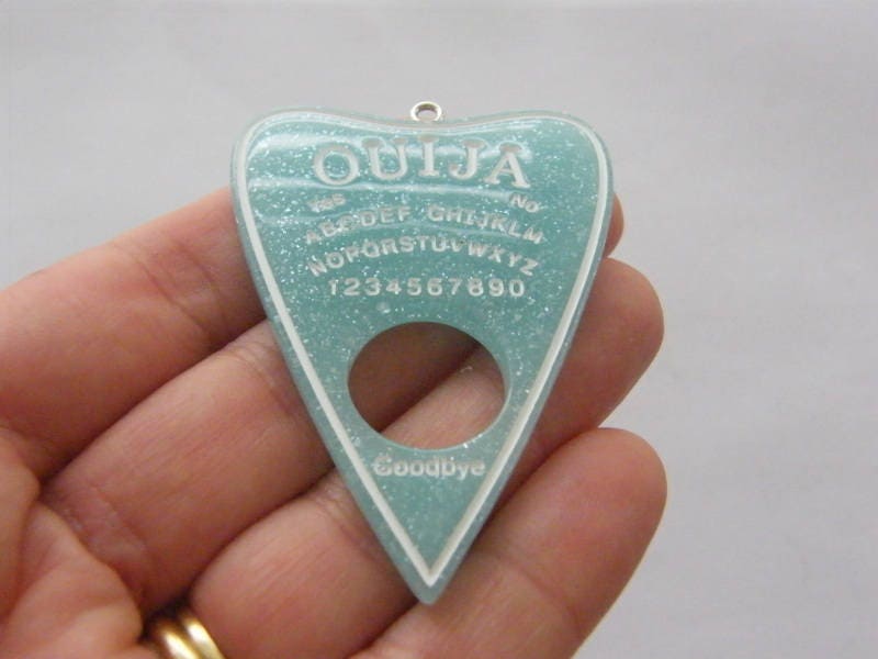 1 Ouija board planchette pendant blue resin  charm HC217