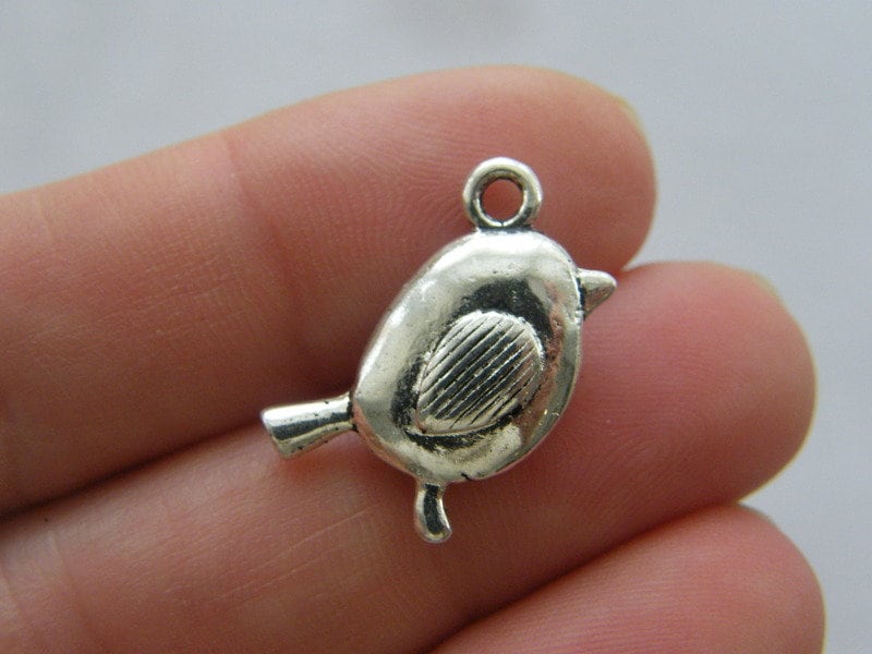 6 Bird charms antique silver tone B248