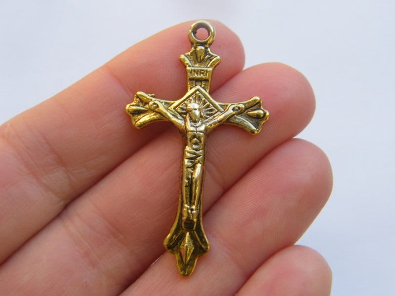 4 Cross charms antique gold tone C38