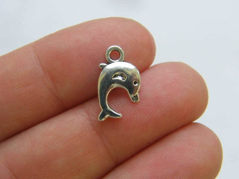 12 Dolphin charms  antique silver tone  FF468