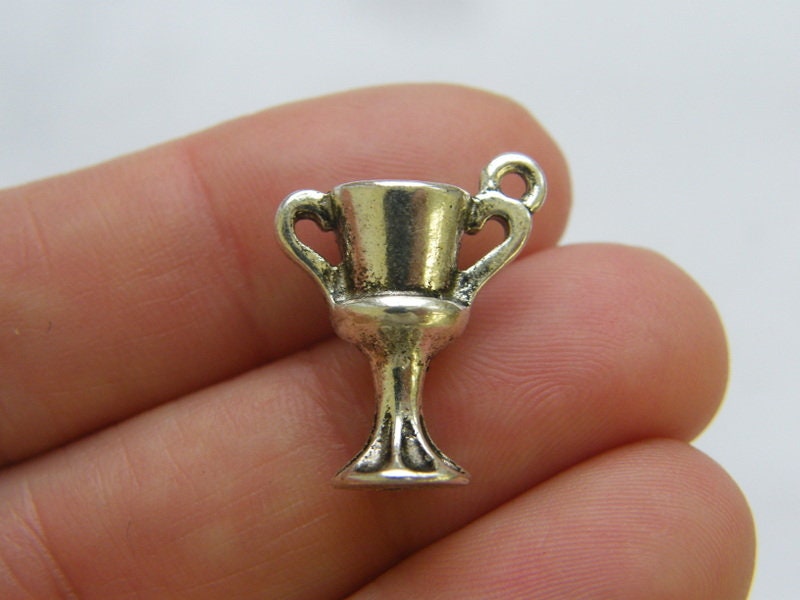 4 Trophy  charms antique silver tone P287