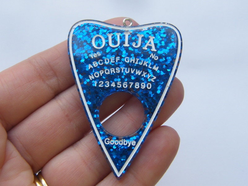 1 Ouija board planchette pendant blue resin  charm HC245