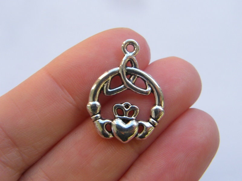 8 Celtic knot charms antique silver tone R160
