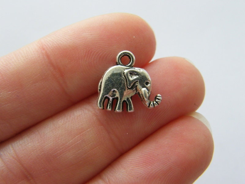 10 Elephant charms antique silver tone A917