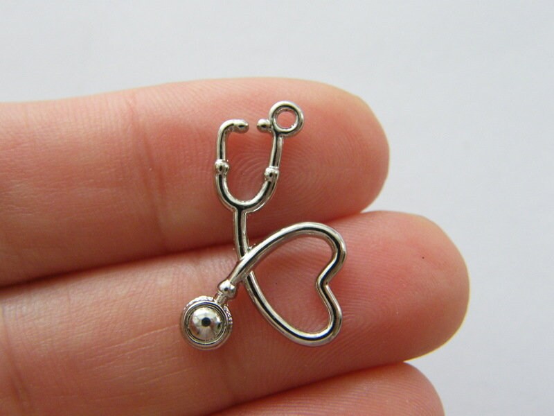 4 Stethoscope charms silver tone MD125