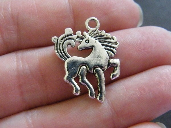8 Horse charms antique silver tone A588