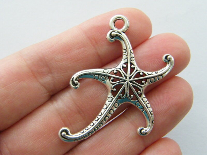 4 Starfish charms antique silver tone FF444
