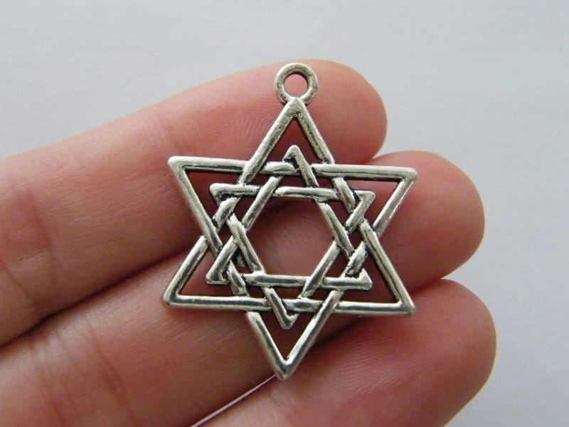 4 Star of David pendants silver tone R170