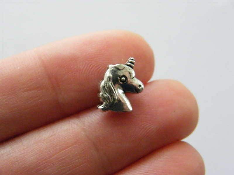 10 Unicorn spacer bead charms antique silver tone A555