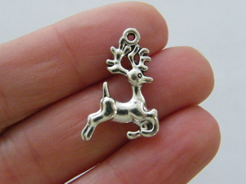 6 Reindeer charms antique silver tone A1059