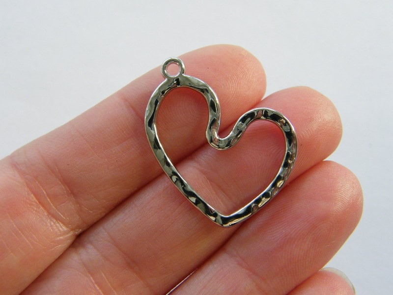 4 Heart charms silver tone H234
