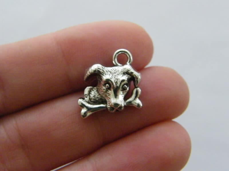 6 Dog charms antique silver tone A1029