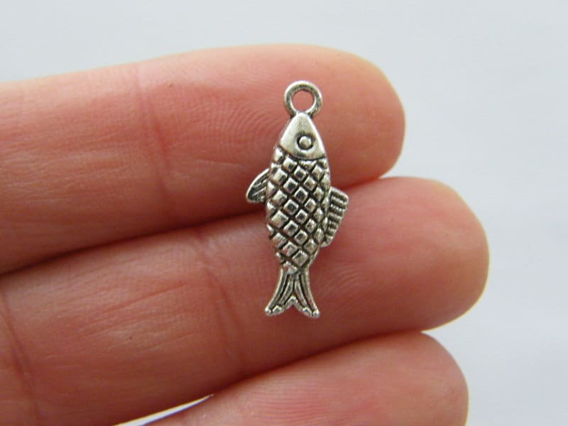 8 Fish charms antique silver tone FF358