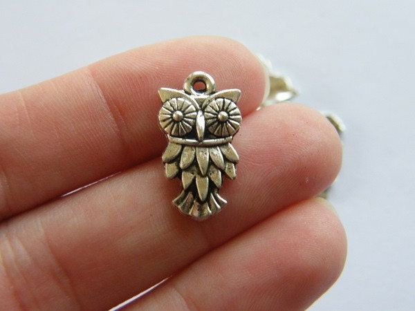 8 Owl charms antique silver tone B296