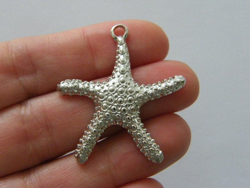 4 Starfish pendants silver tone FF511
