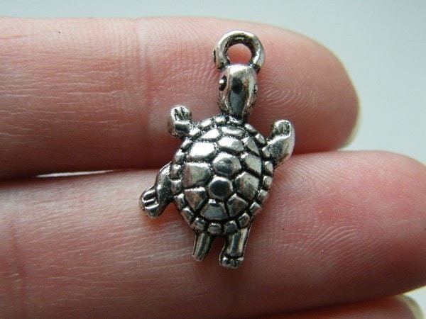 8 Tortoise charms  antique silver tone FF131