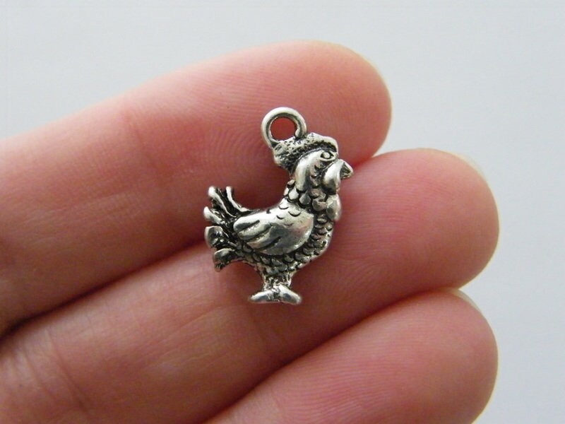 8 Chicken charms antique silver tone B360