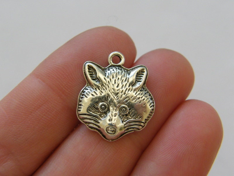 4 Raccoon charms antique silver tone A1079