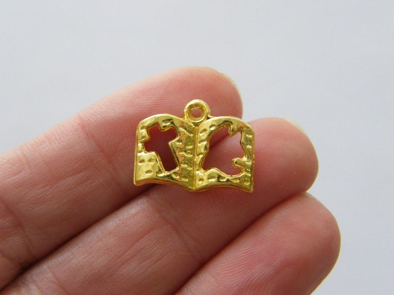 20 Bible charms bright gold tone R49