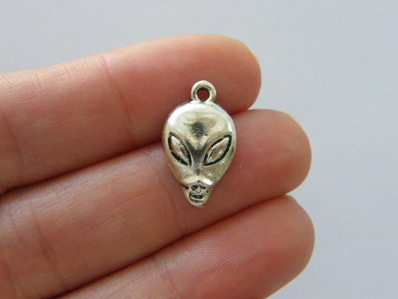 12 Alien charms antique silver tone P363
