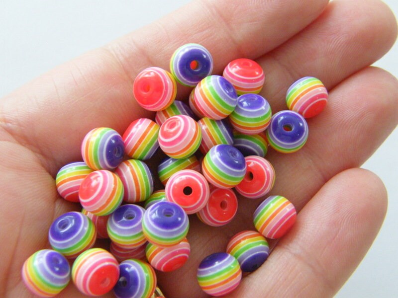 100 Rainbow striped resin beads B178