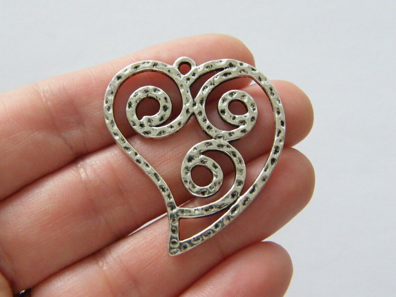 4 Heart pendants antique silver tone H7